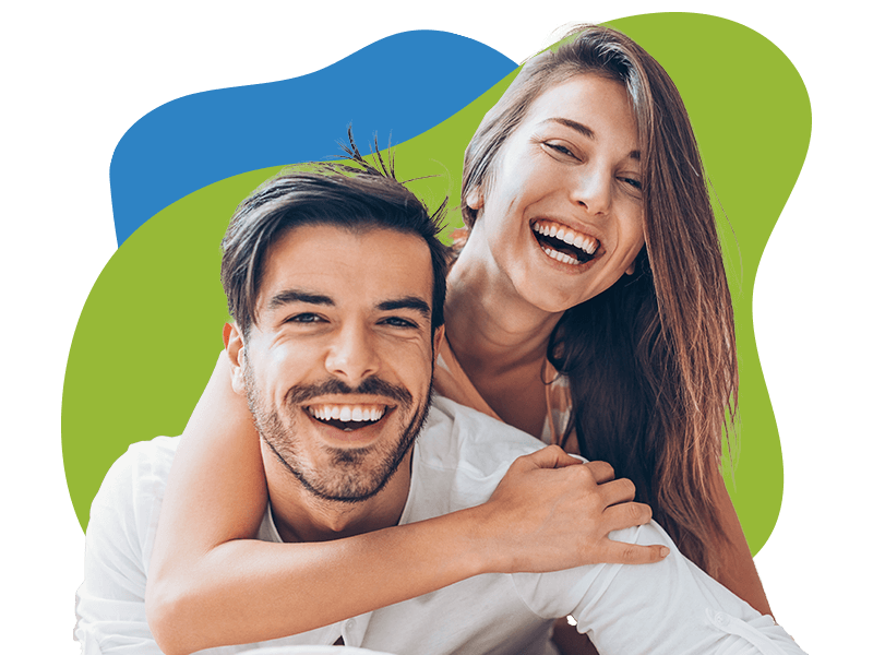 young happy couple embracing and smiling